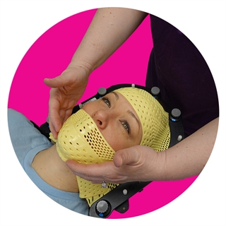 Patient using Encompass SRS Immobilization System