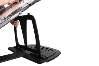 Black accessories ladders that elevate a supine breast board to 20° & 25° angles